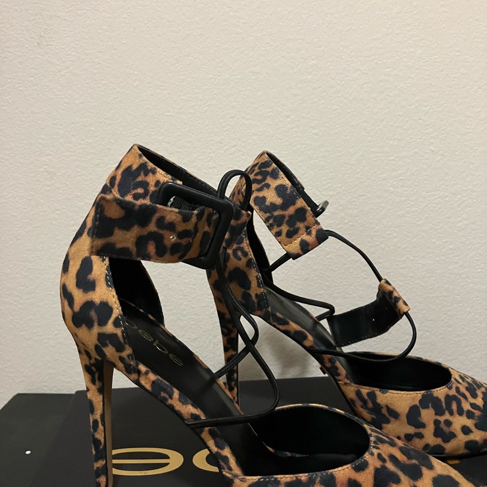 Bebe high heels Ankle strap and crisscross strap Leopard print Size 9 never worn